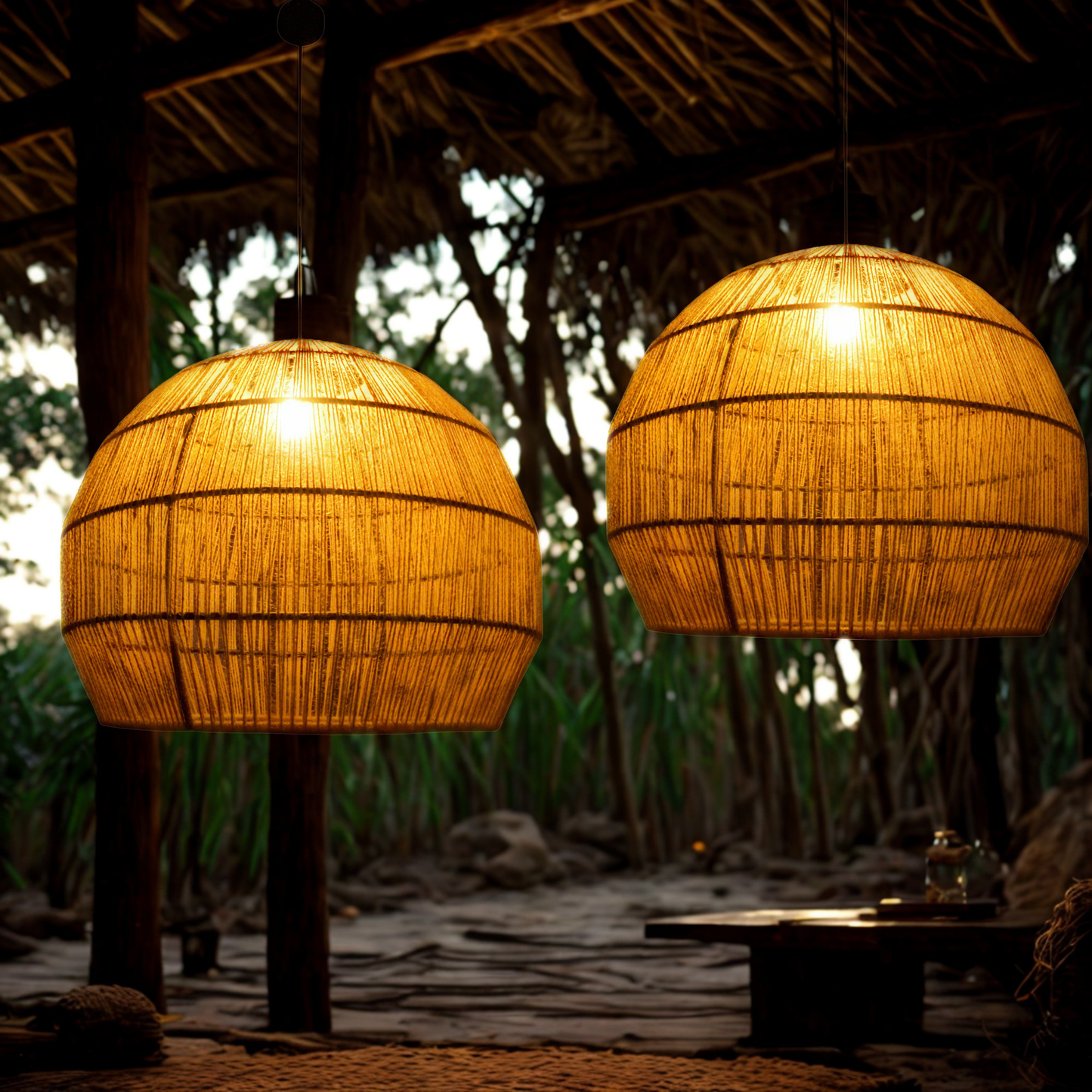 Two large spherical woven natural twine pendant lights glowing warmly, hanging in a rustic outdoor pavilion with a thatched roof and wooden posts.