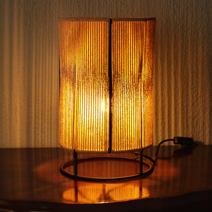 Handcrafted natural cotton twine beige table lamp with warm light streaks